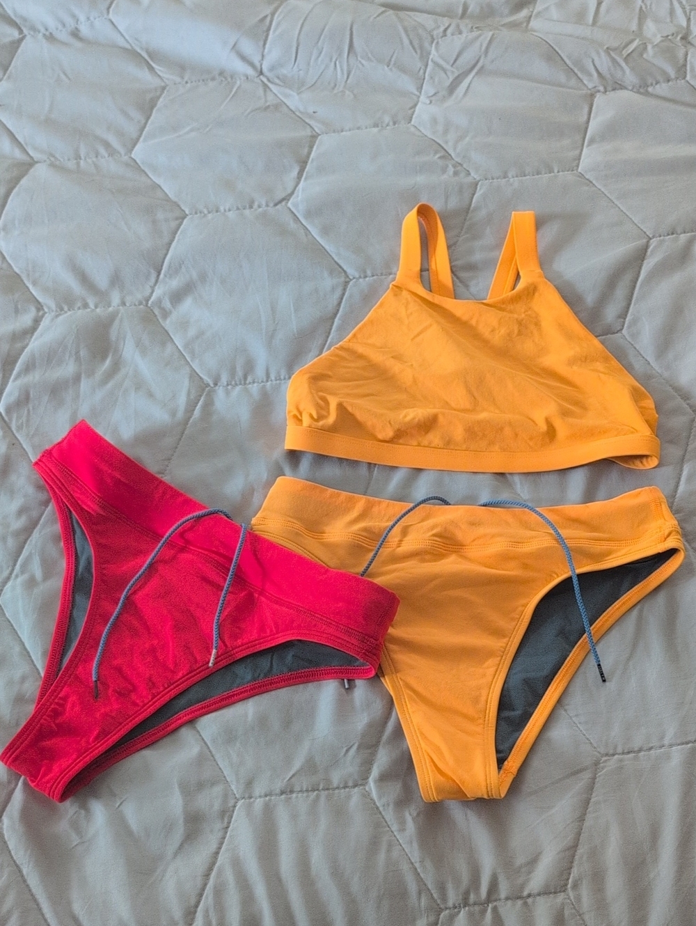 Jolyn Orange High-Neck Bikini Top with Orange & Pink Bottoms